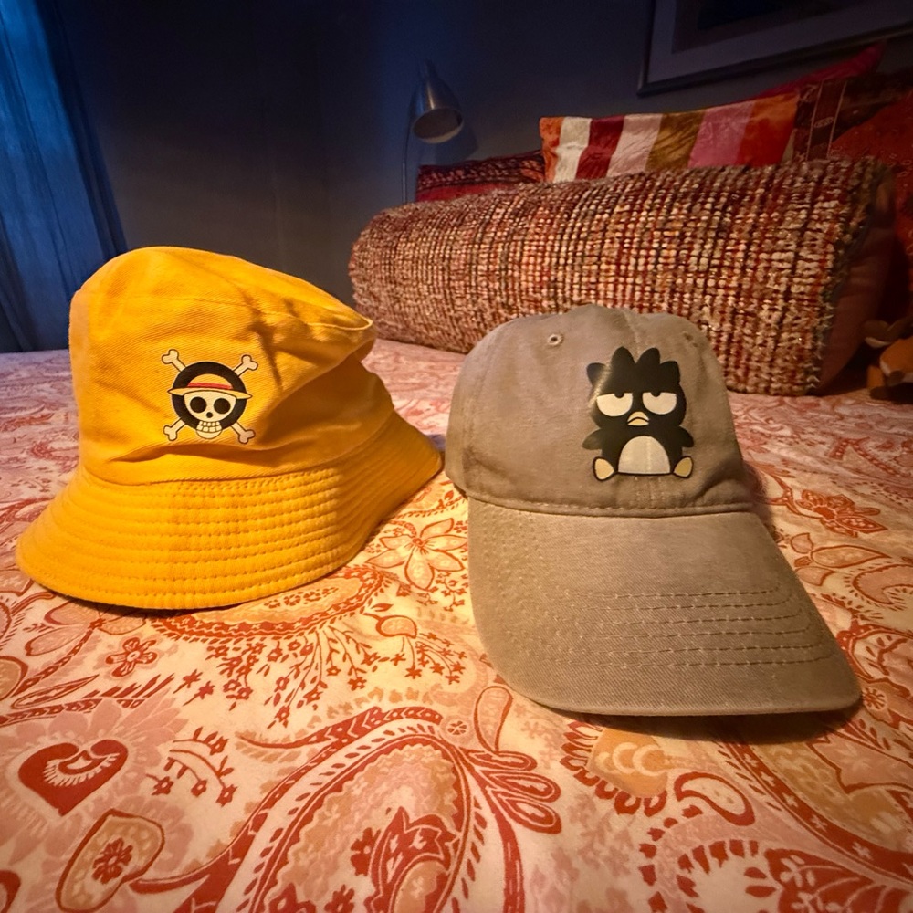 Two items combo: One Piece Yellow Bucket Hat and Badtz Maru Gray Cap NWOT